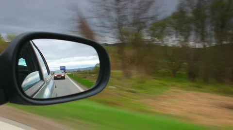 Car driving and stop looking through mirror Stock Footage 691633