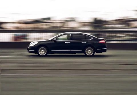 The car driving a bridge Stock Photos