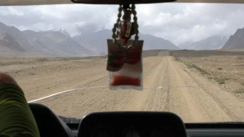 Car driving on a bumpy road on the Pamir Highway, 4K, DNxHR 스톡 동영상 150591977