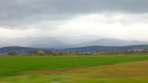 Car driving cloudy sky and mountains cut1 Stock Footage 692033