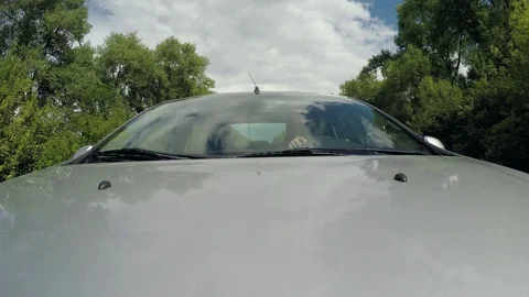 Car driving on the daytime highway, windshield. Tourism, travel in car Stock Footage 99405941
