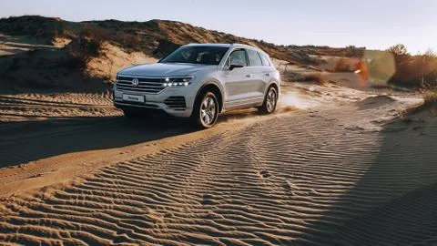 Car driving in desert Stock Photos