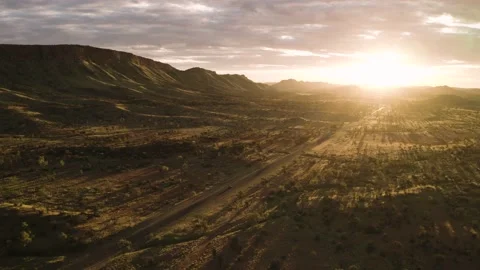 Car Driving Down Desert Highway At Sunset Stock Footage 194715947