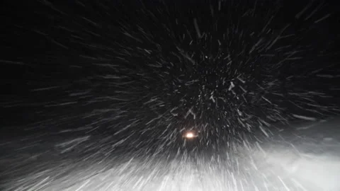 A Car Driving Down the Highway Through Snow and Blizzard Looking Through the Stock Footage 141971081