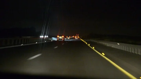 Car Driving Down Highway, view on night highway from car Stock Footage 102002678
