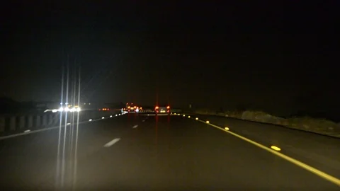 Car Driving Down Highway, view on night highway from car Видео 102002721