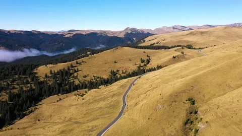 Car driving down on mountain road highway through rural landscape. Stock-Footage 150556780