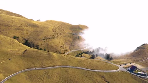 Car driving down on mountain road highway through rural landscape. Stock Footage 150556898