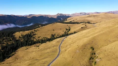 Car driving down on mountain road highway through rural landscape. Stock Footage 150608946