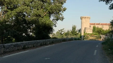 Car driving down road to Old historic castle in Provence France 스톡 동영상 95252654