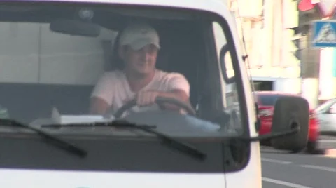 Car driving by the driver behind the wheel Stock Footage 5165043