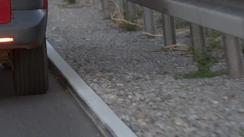 Car driving on the edge of the road Vidéo 96768568