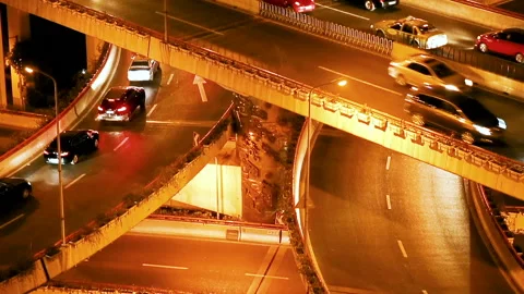 Car driving on an elevated road at night Video stock 113814695