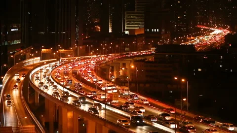 Car driving on an elevated road at night Video stock 113854939