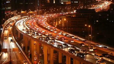 Car driving on an elevated road at night Video stock 113872910