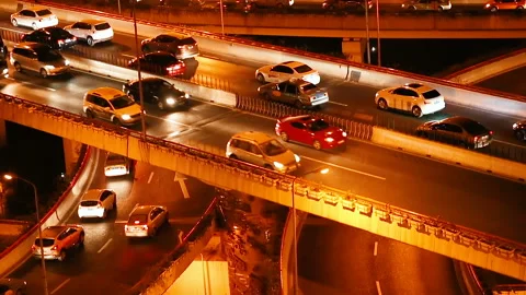 Car driving on an elevated road at night Video stock 113961935