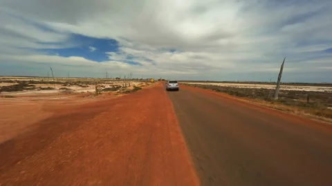 A car driving on an empty road in Australia Stock Footage 244636191