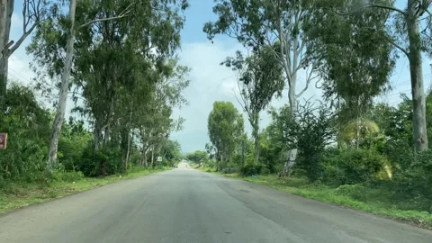 Car driving on empty road Video stock 163755492