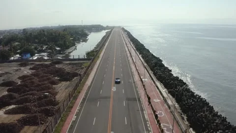 Car driving in empty road 動画素材 250970520