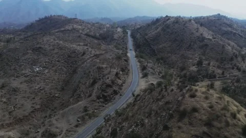 Car Driving on Empty Rural Road Through Arid Hills, Rohida, Rajasthan, India. Stock Footage 331984953