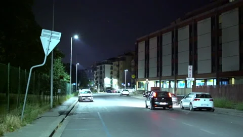 Car driving fast in an empty city road in the night 스톡 동영상 154900295