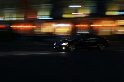 Car driving fast Stock Photos