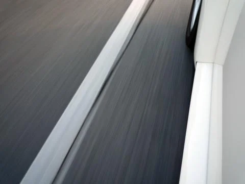 Car driving fast Stock Photos