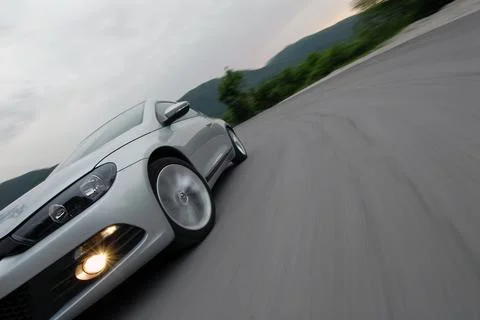 Car driving fast Stock Photos