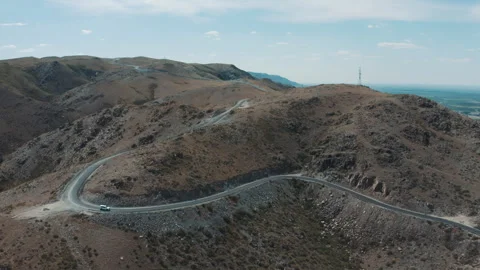 The car is driving high in the mountains Video stock 249507030