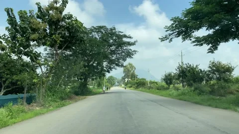Car driving on highway with tree and sky background Stock Footage 163755461