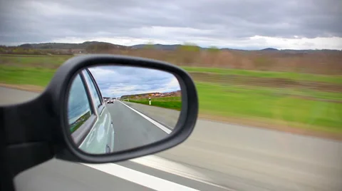 Car driving look from mirror Stock Footage 5090834
