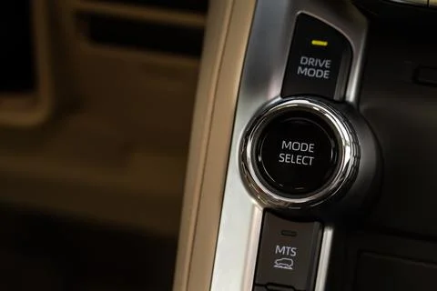 Car driving mode switch. Drive mode selector button. Photos