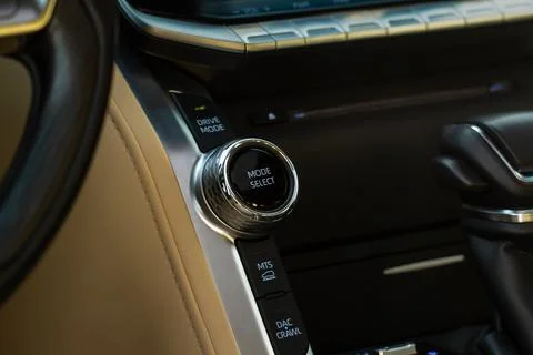 Car driving mode switch. Drive mode selector button. Photos