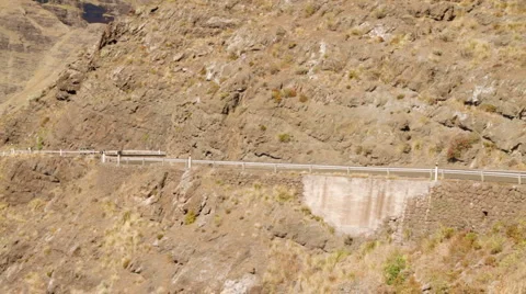 Car driving on a mountain pass Stock Footage 6930489