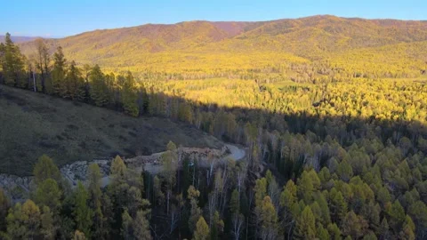 The car is driving on a mountain road far below Video stock 145609918
