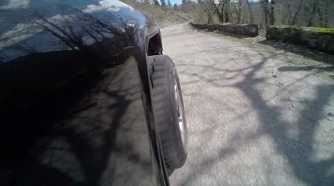 Car driving on a mountain road Stock Footage 61788633