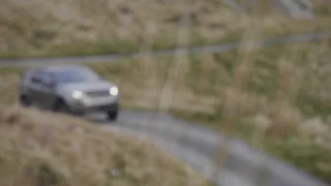 Car Driving on mountain road Stock-Footage 144385429
