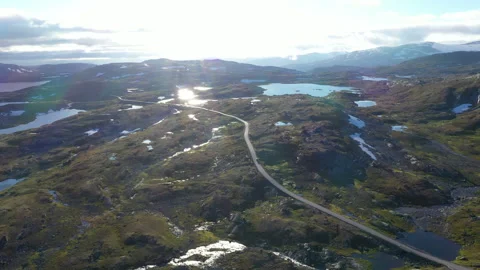 Car driving on mountain road seen from drone Stock Footage 244600818