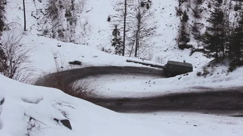 Car driving on a mountainous snow-covered road Stock Footage 59159128