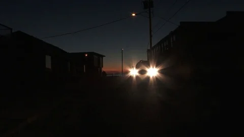 Car Driving At Night In Beach Community Stock-Footage 80964560