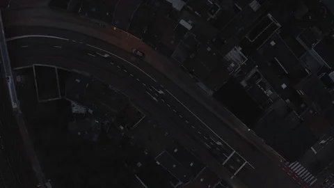 Car driving at night at empty road top down static Aerial view in big city Stock Footage 123090215