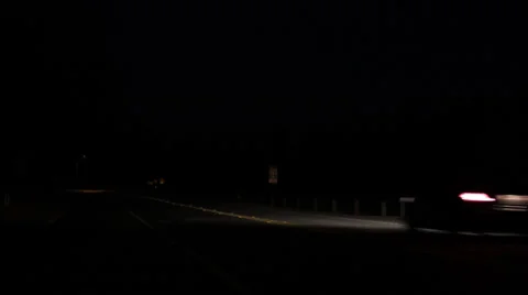 Car Driving by at Night Stock Footage