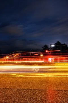 Car driving night stop traffic asphalt concrete Stock Photos