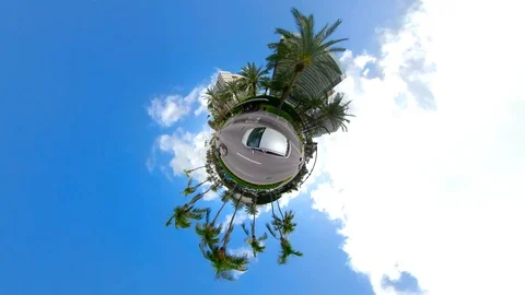 Car driving on an orbiting tiny planet Stock-Footage 85770363