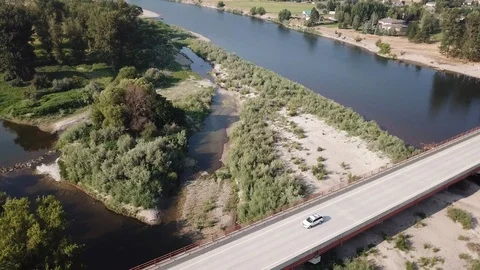 Car driving over bridge Stock Footage 101404576