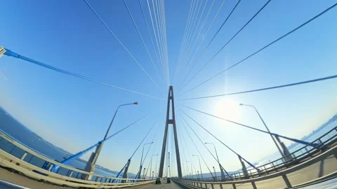 A Car is Driving Over a Large Cable-Stayed Bridge. Stock Footage 303963120