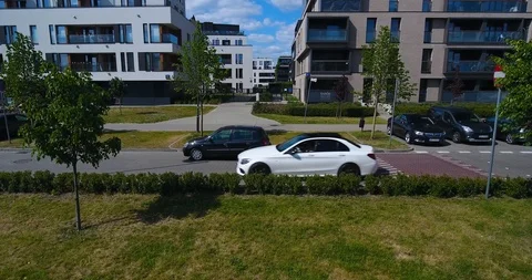 Car Driving Over Speed Bump. Apartment Complex Stock Footage 90261036