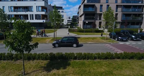 Car Driving Over Speed Bump In Apartment Complex Area Stock Footage 90261122