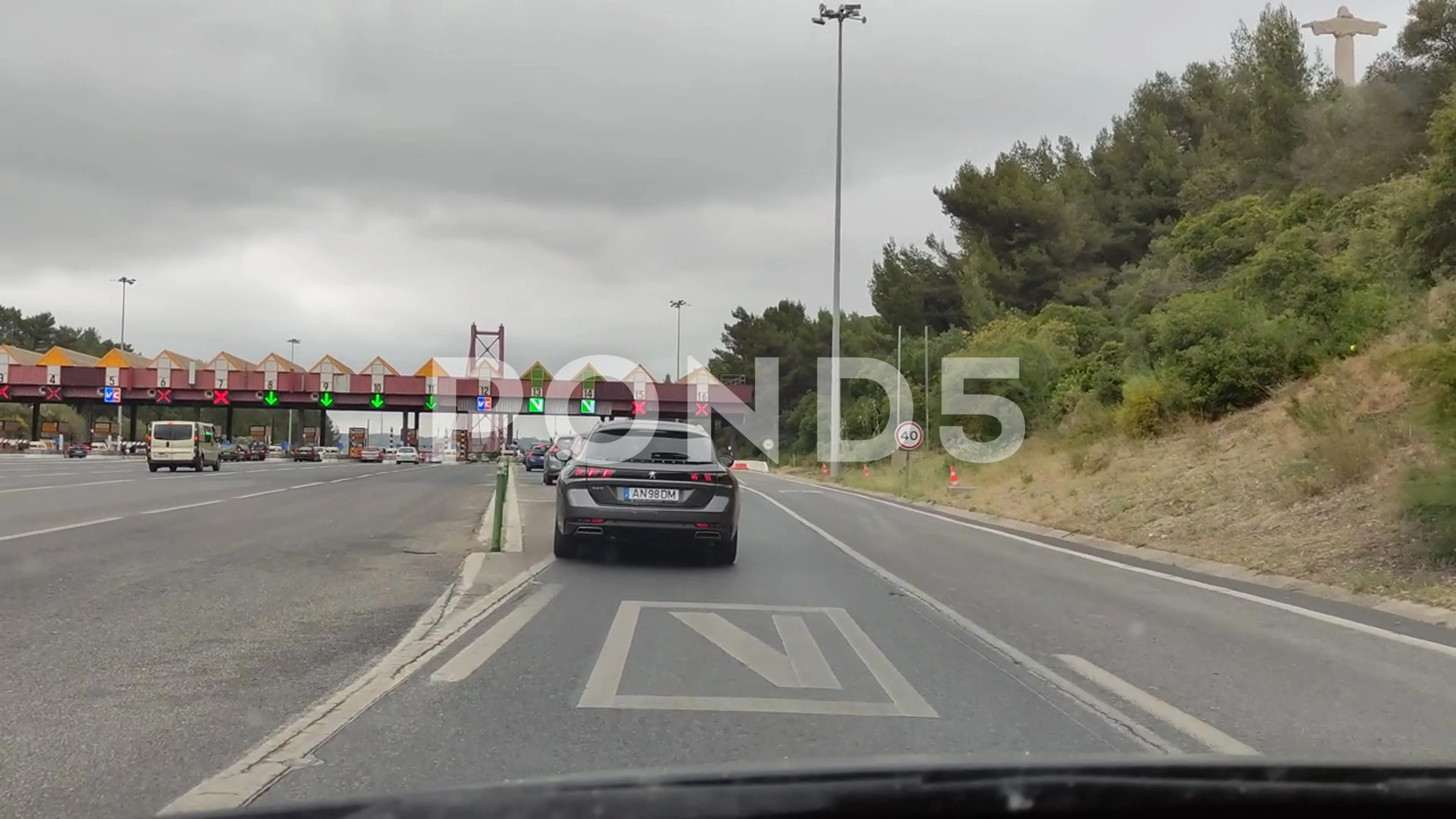 https://images.pond5.com/car-driving-passing-toll-road-195705322_prevstill.jpeg