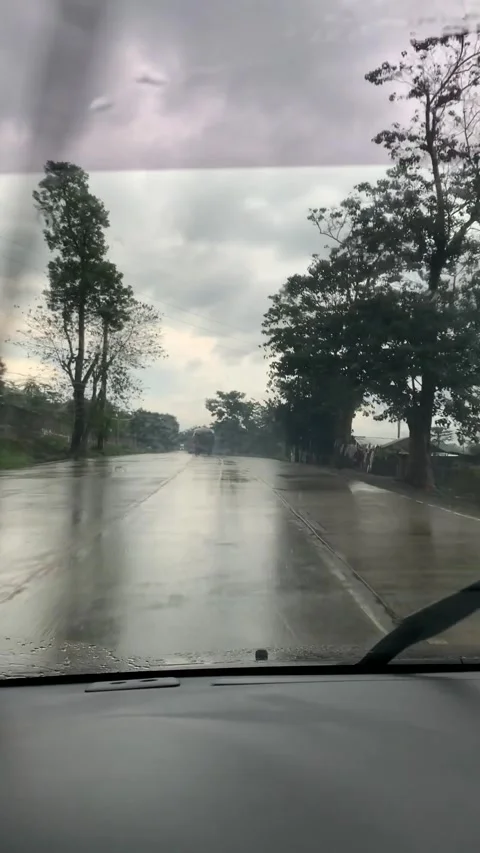 Car driving in rainy day Stock Footage 161963553